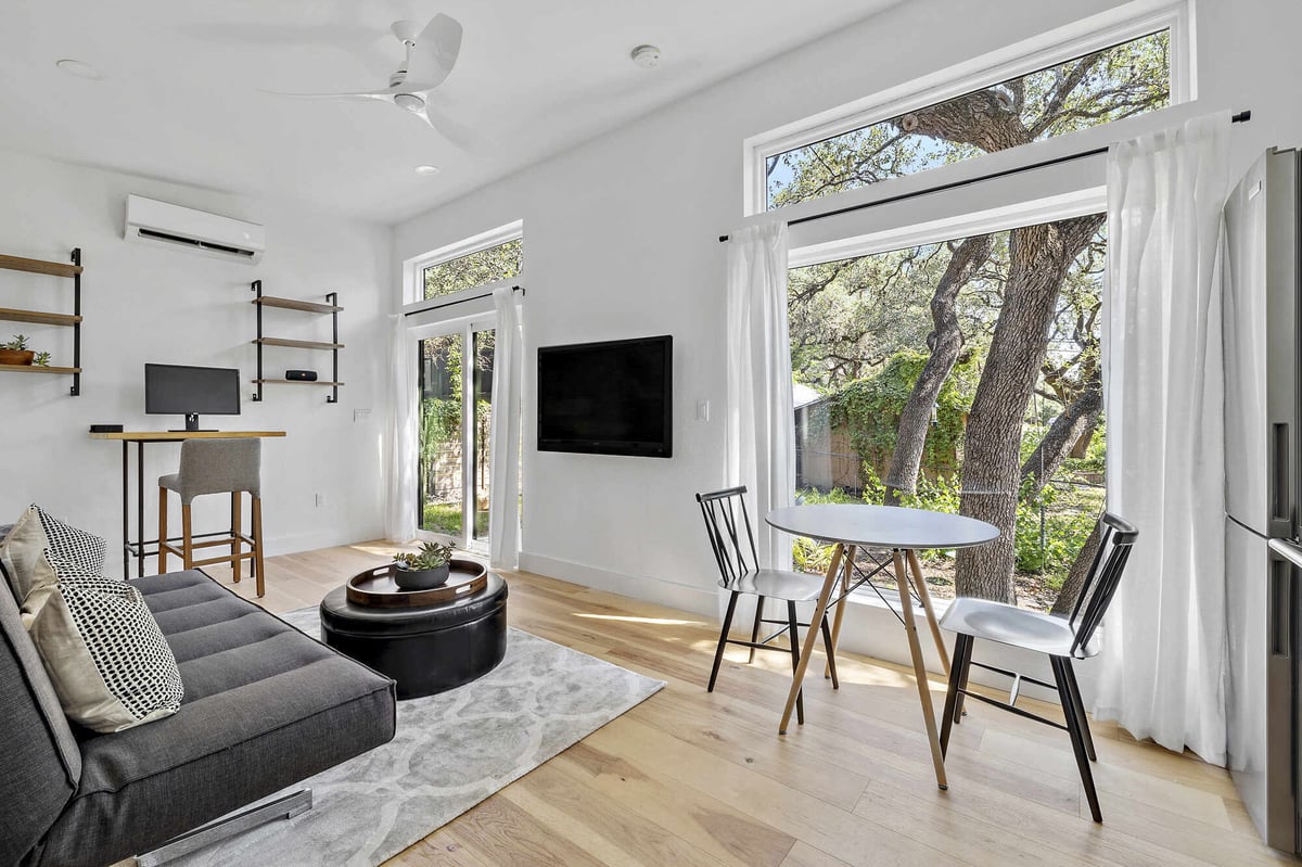 RedOven Builds modern custom home interior with bright living space and kitchen Austin TX 3102 S Oak Dr