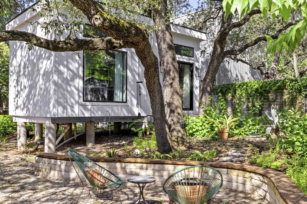 RedOven Builds custom home kitchen design with natural light and dining area Austin TX 3102 S Oak Dr