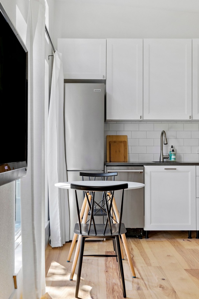 RedOven Builds custom home kitchen with dining nook and natural light Austin TX 3102 S Oak Dr