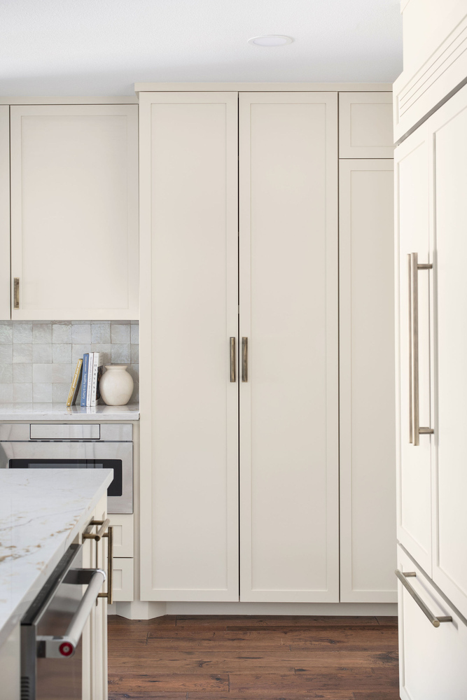 tall pantry cabinets in kitchen remodel by RedOven Builds in Whitemarsh Austin TX