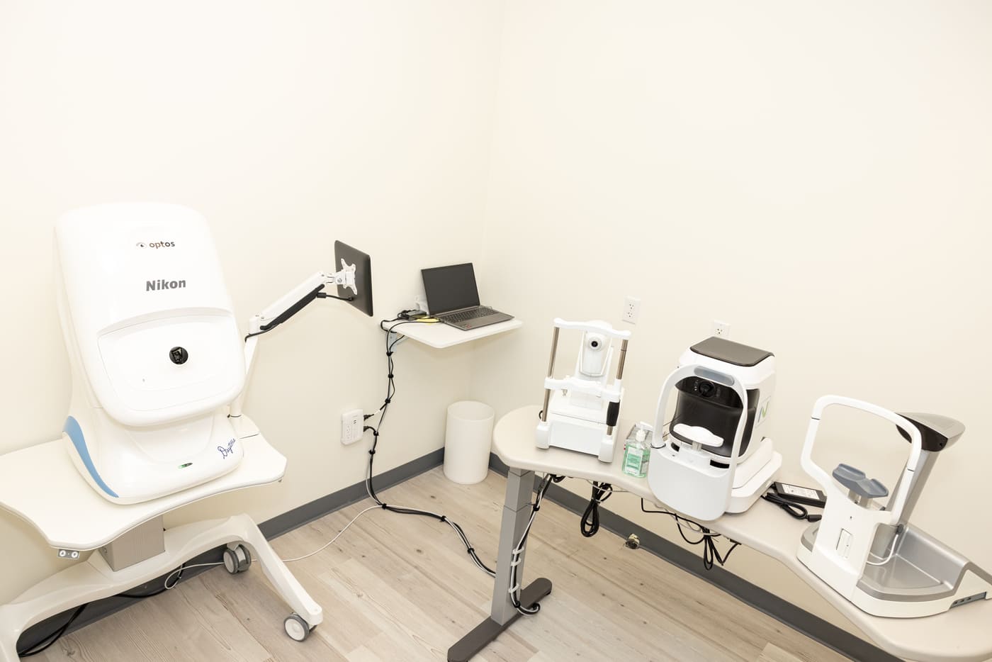Eye imaging room with diagnostic equipment and workstation in Austin, TX eye center by RedOven Builds