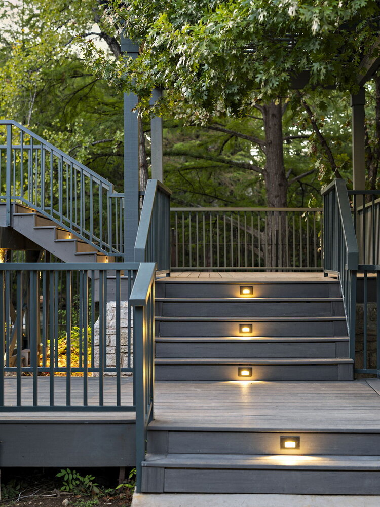 RedOven Builds commercial remodel deck stairs with built in lighting at 4408 Long Champ Dr Austin TX