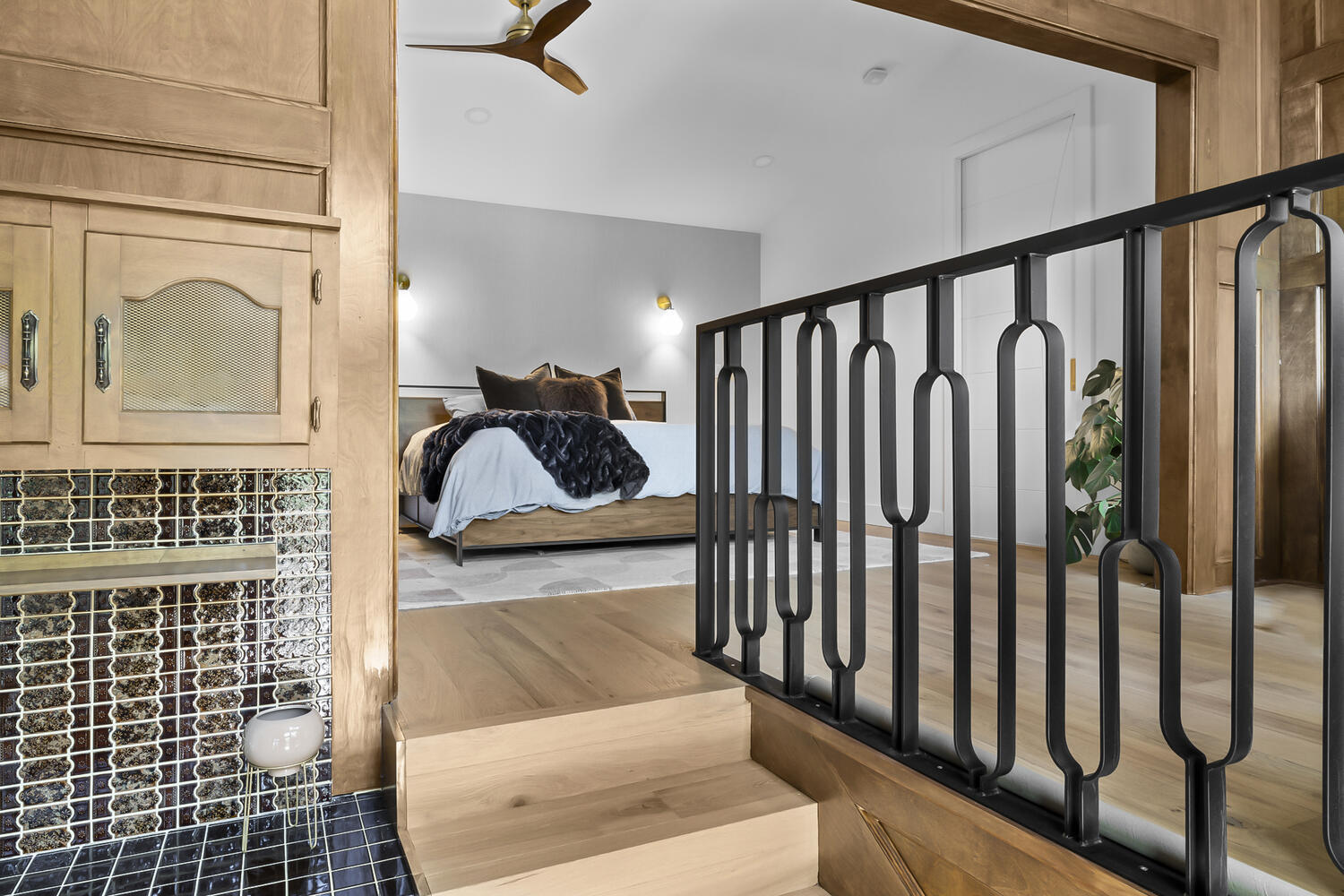 Modern bedroom space with elevated design and custom wood finishes in Austin TX by RedOven Builds