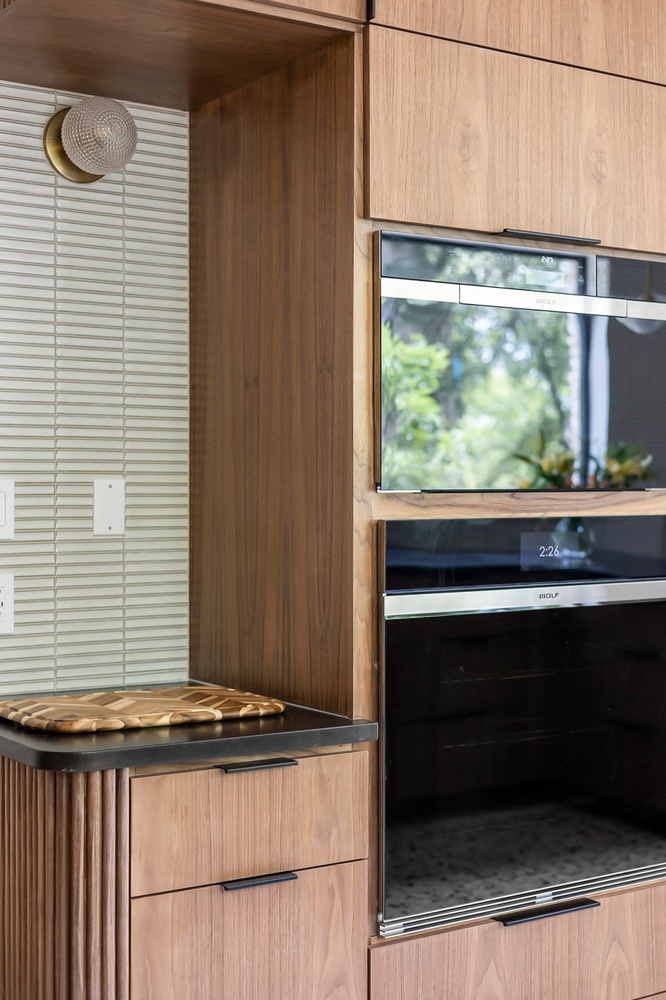 built in oven wall with wood cabinetry by RedOven Builds Austin TX kitchen remodel