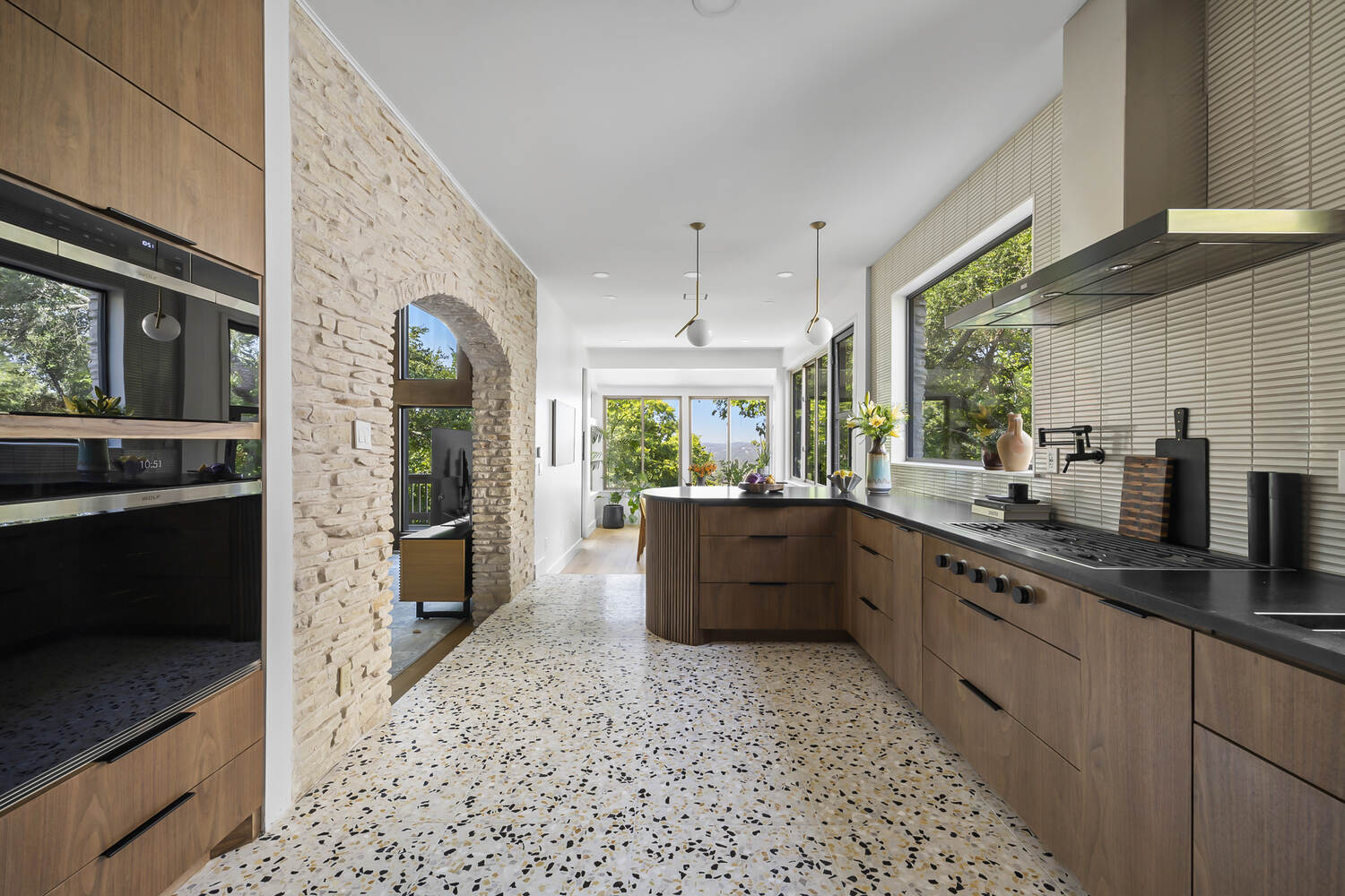 kitchen cabinetry and storage with modern design in Austin TX full home remodel by RedOven Builds