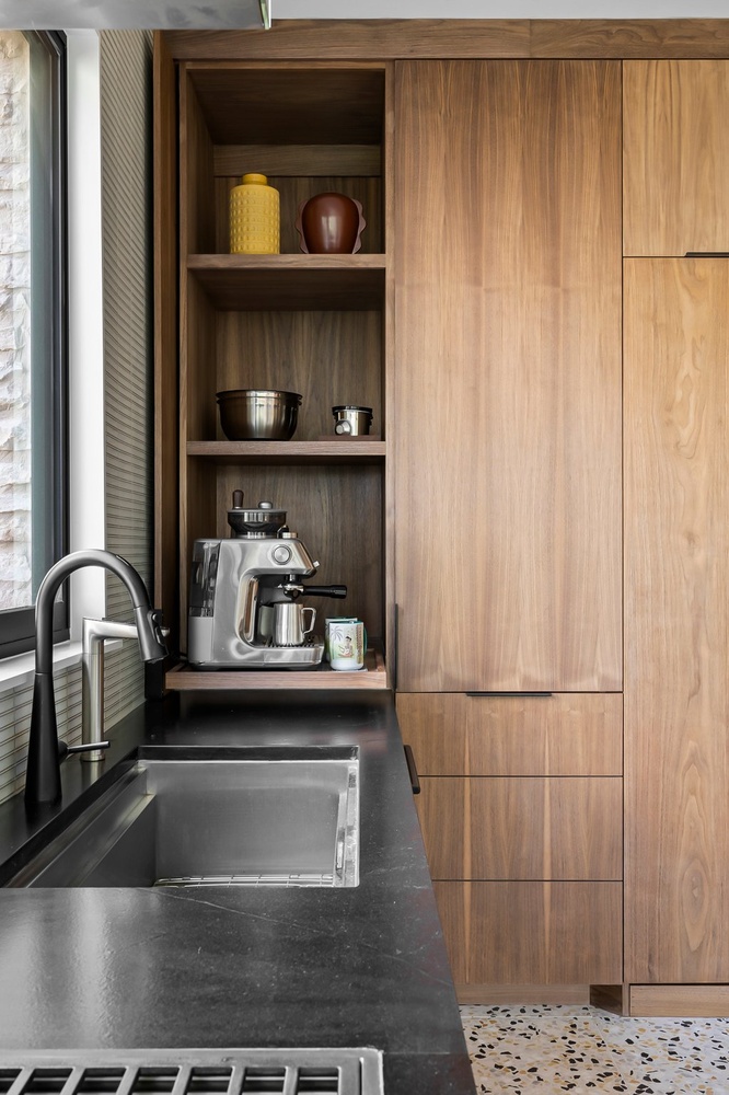 kitchen sink area with built-in coffee station and wood cabinets by RedOven Builds Austin TX