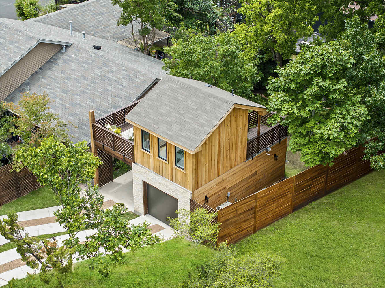 Elevated ADU with rooftop deck and garage built by RedOven Builds in Austin, TX