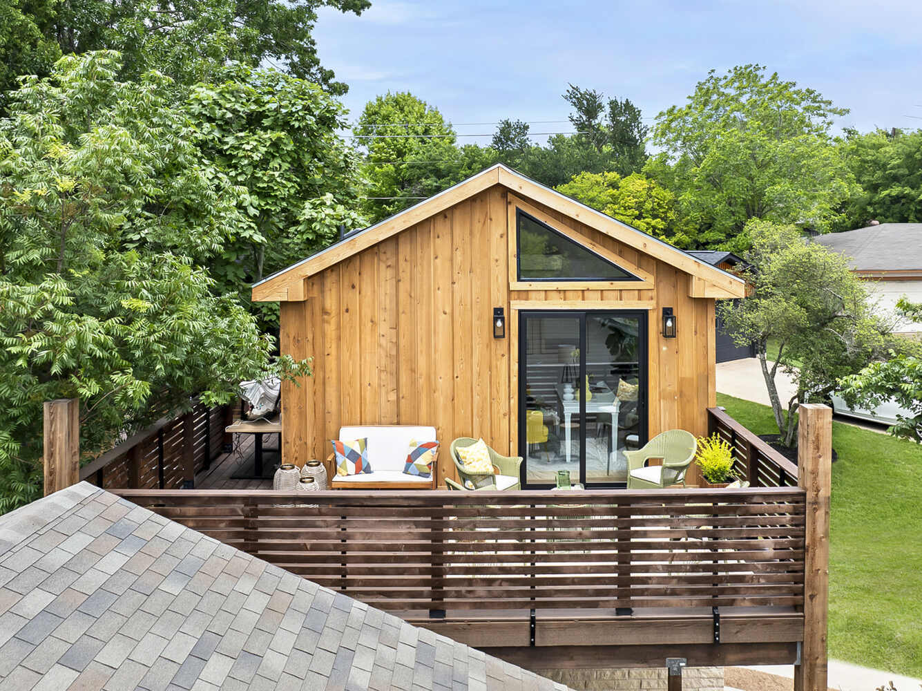 Elevated outdoor living space on a custom ADU by RedOven Builds in Austin, TX