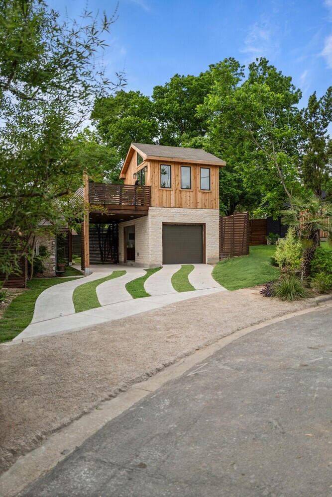 RedOven Builds ADU exterior front view with driveway and landscaping in Austin, TX