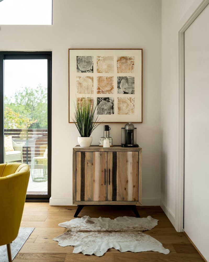 RedOven Builds ADU interior with cabinet, artwork, and coffee station in Austin, TX