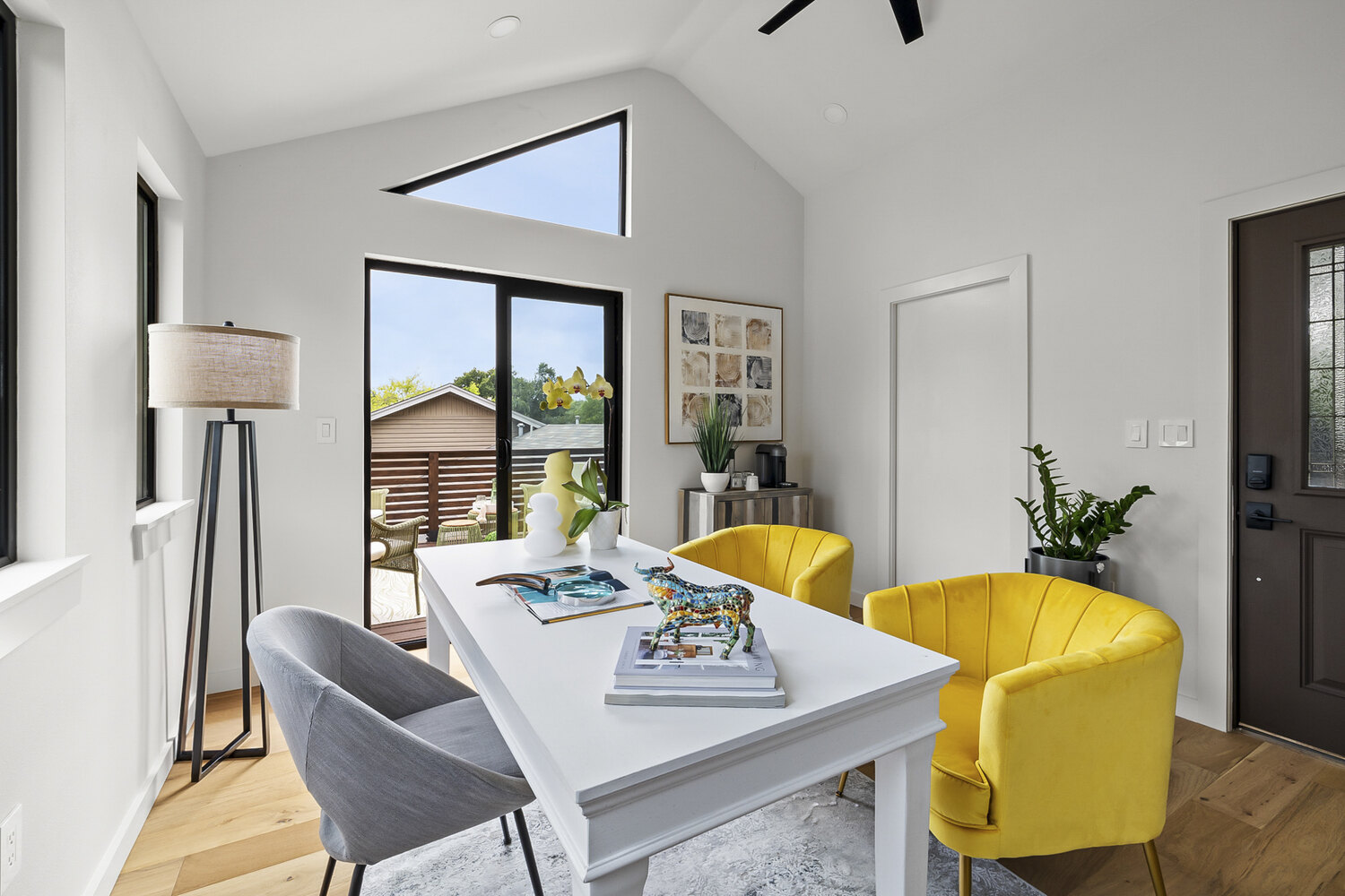 contemporary ADU office design with high ceilings and natural light by RedOven Builds in Austin TX