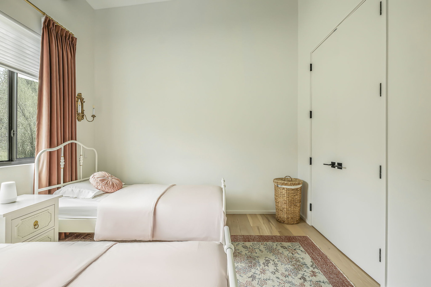 children’s bedroom in RedOven Builds home featuring soft tones and wood flooring in San Juan Dr Rio Grande TX