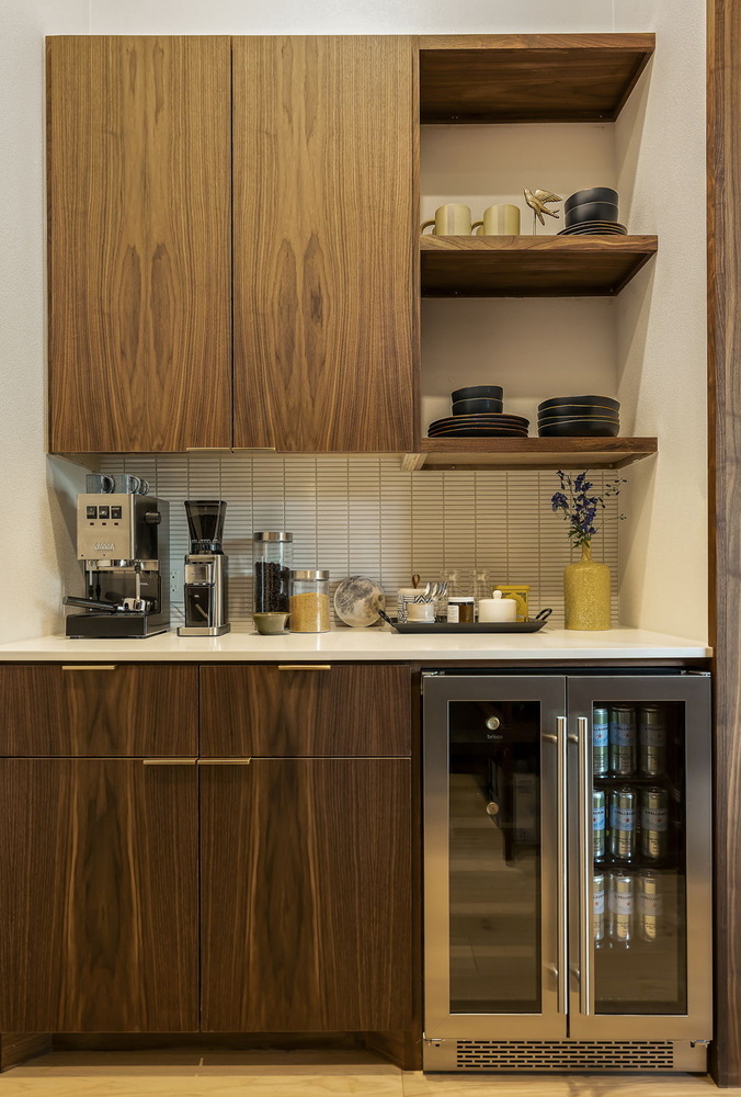close-up of walnut kitchen cabinetry and coffee bar with beverage fridge by RedOven Builds in Rio Grande TX