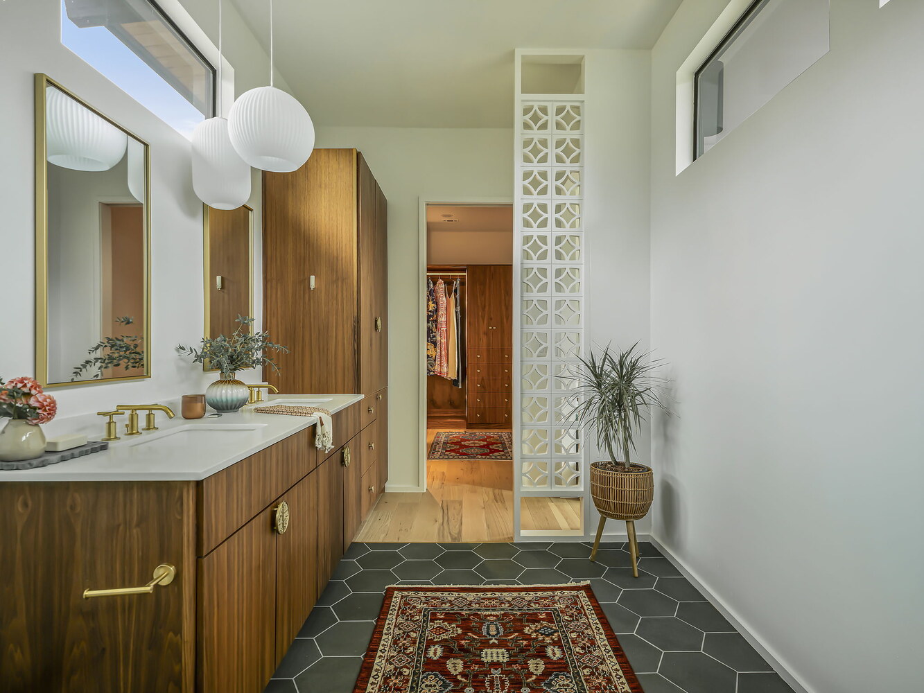 custom new build bathroom with double vanity, pendant lighting, and hex tile floor by RedOven Builds in Rio Grande TX