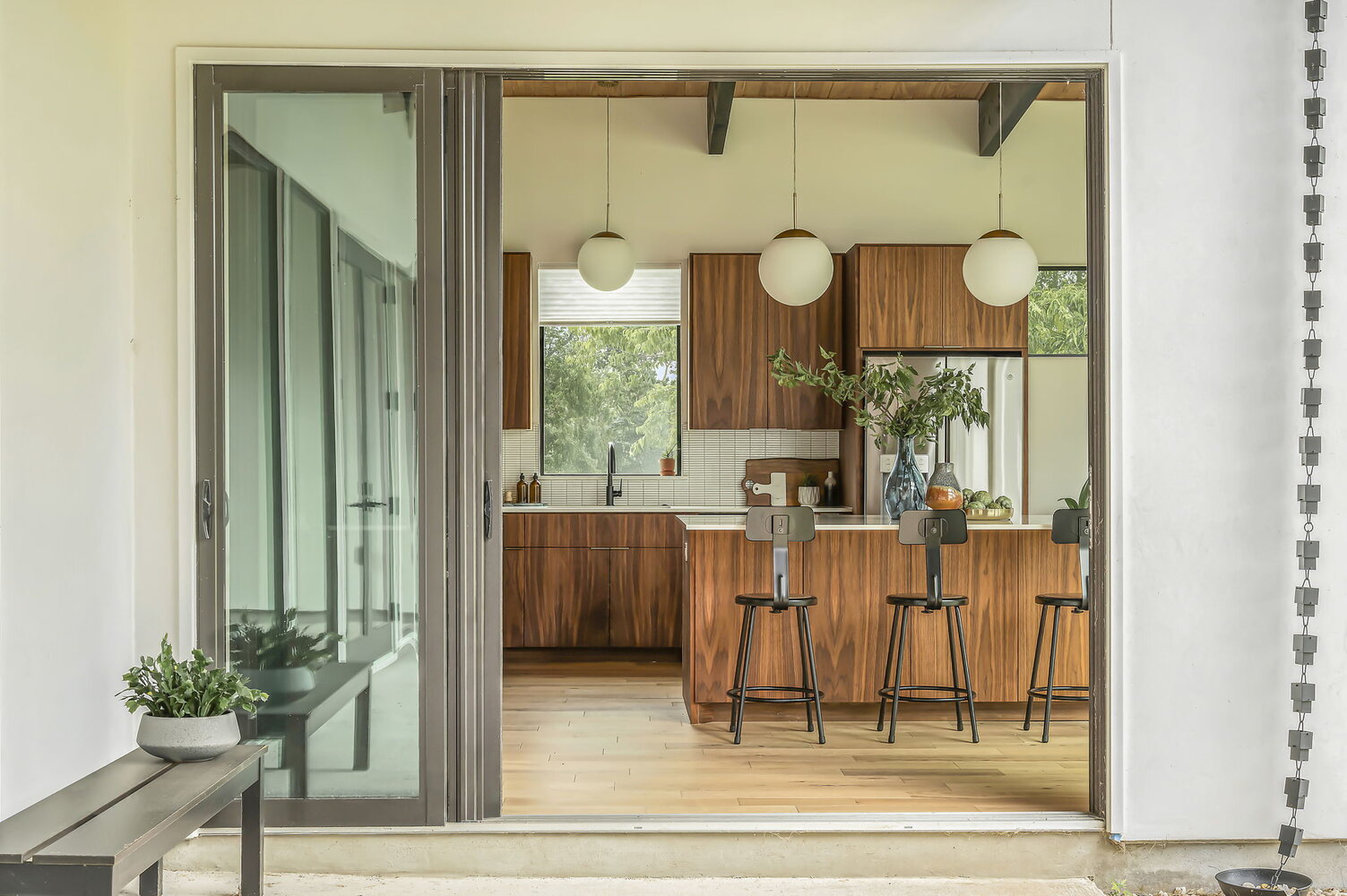 modern kitchen connected to outdoor space in RedOven Builds custom new build San Juan Dr Rio Grande TX