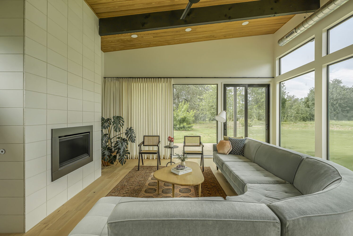 spacious living room with high ceilings and large windows in RedOven Builds custom home San Juan Dr Rio Grande TX