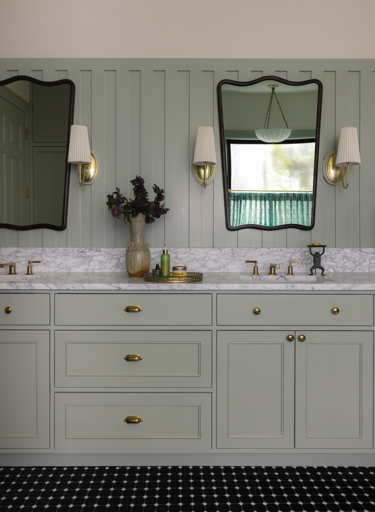 Double vanity bathroom remodel by RedOven Builds in West Rim Dr Austin TX with marble countertop and mirrors