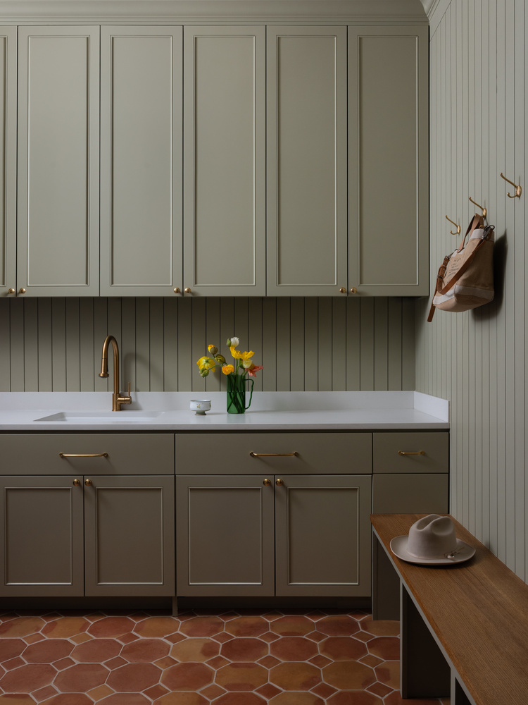 Mudroom cabinetry remodel by RedOven Builds in West Rim Dr Austin TX with built-in storage and bench seating